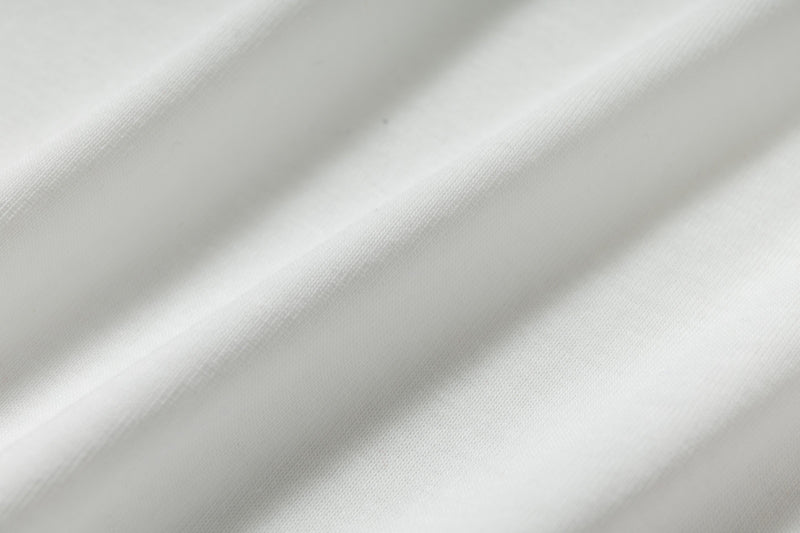Close-up of white shirt fabric texture and drape