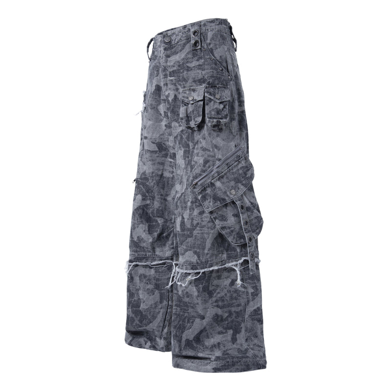 Gray distressed camo cargo pants angled front view with flap pockets
