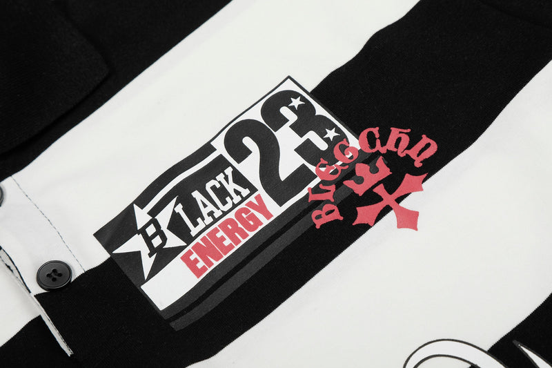 Black and white rugby stripe polo shirt with bold graphic print and red energy lettering on chest