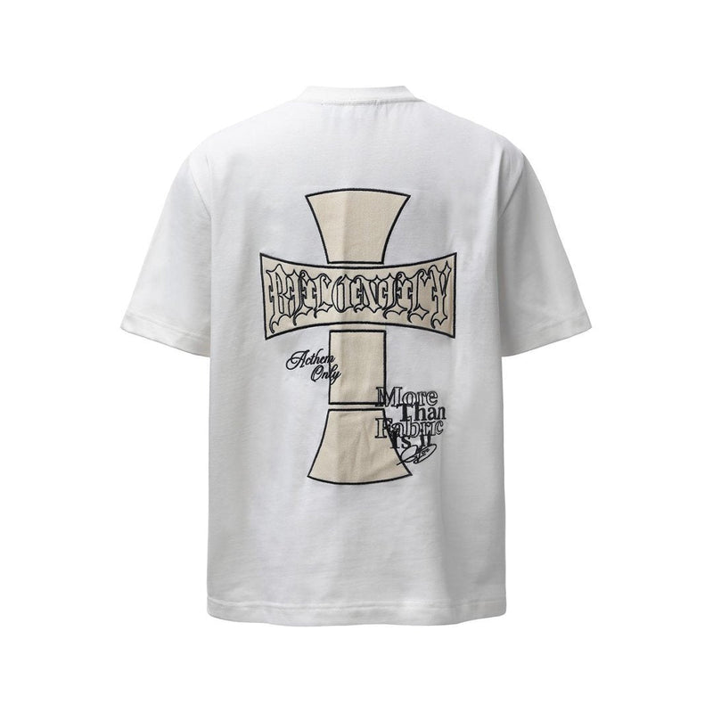 White streetwear tee with a large cross graphic and gothic text print on the back
