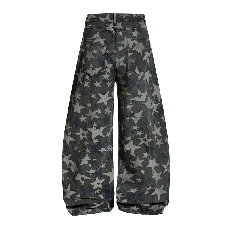 Back view of star print barrel leg jeans with patch pockets