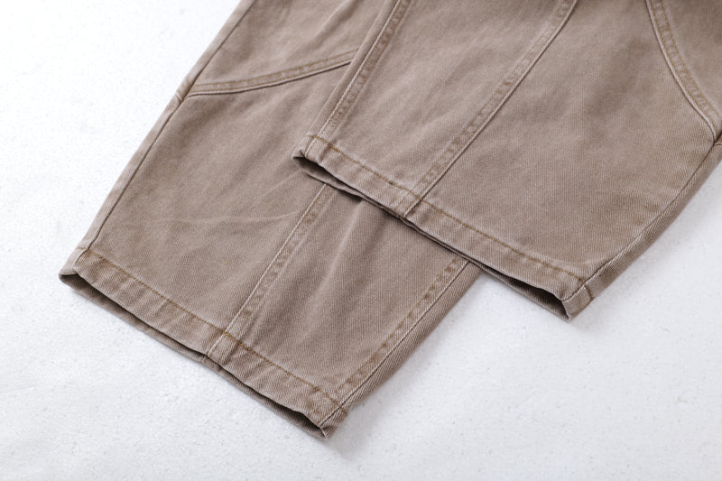 Close-up of tan jeans hem and wide-leg cuff