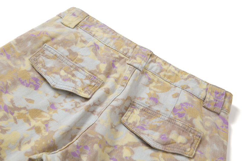 Close-up of the back waistband and pocket flaps on abstract camo cargo pants