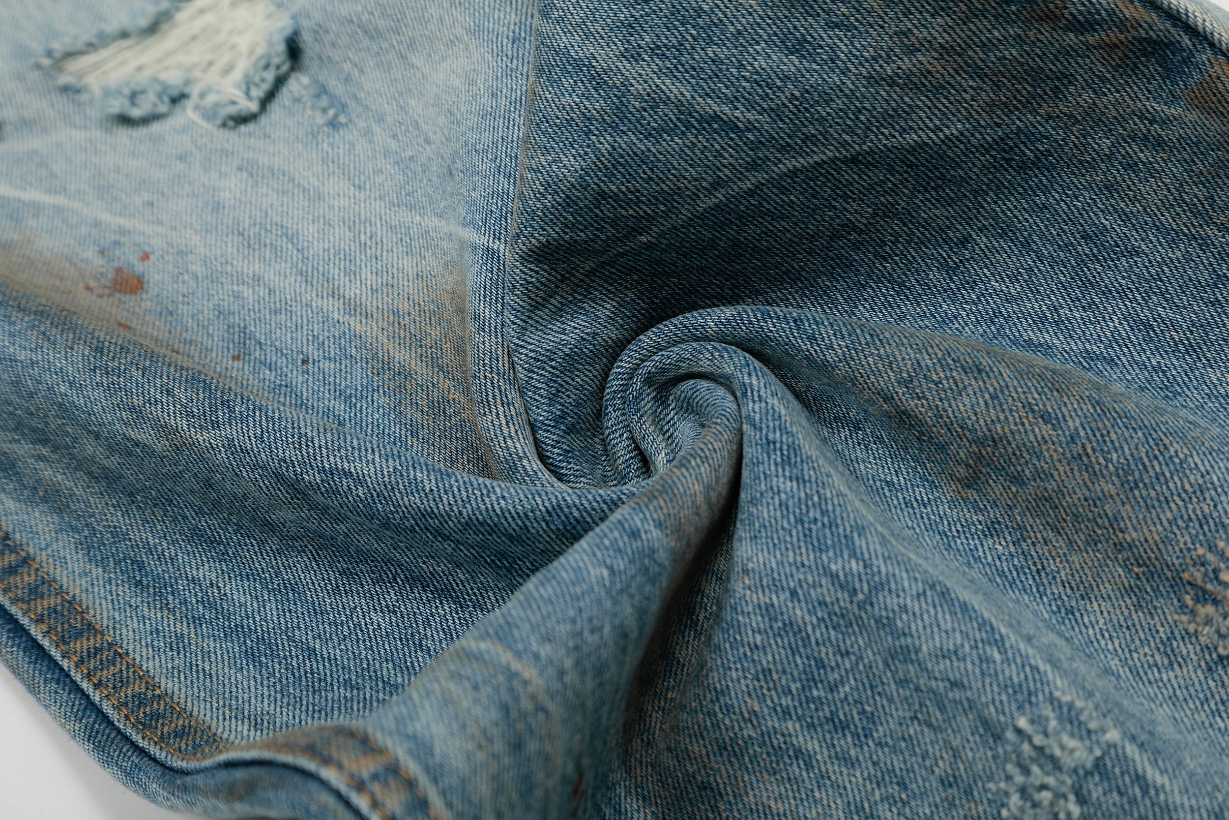 Rust-Wash Distressed Wide-Leg Jeans | Omirad
