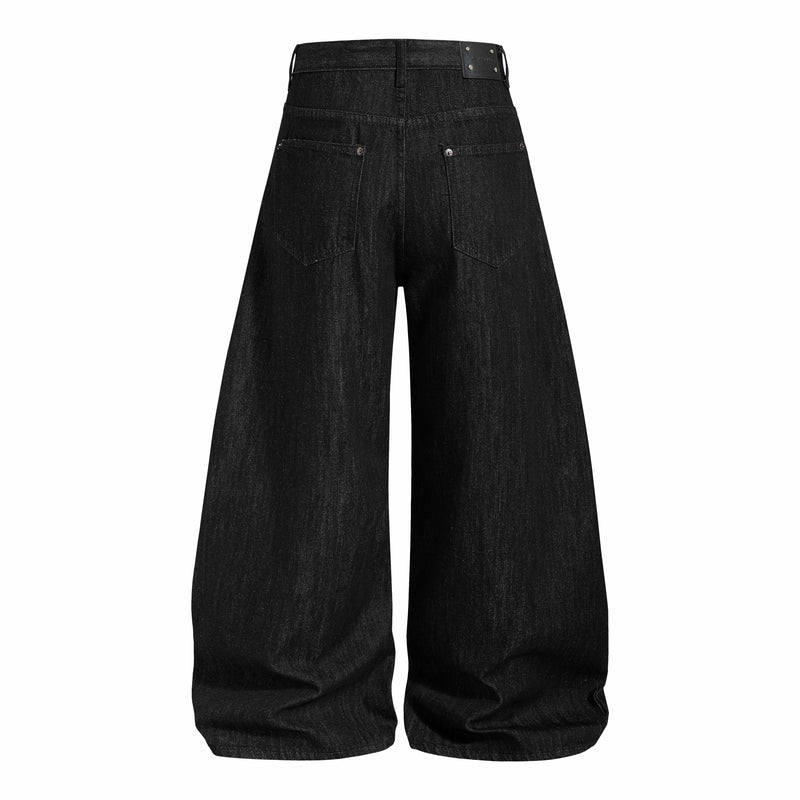 Back view of wide-leg black denim pants with rear pockets and waistband patch