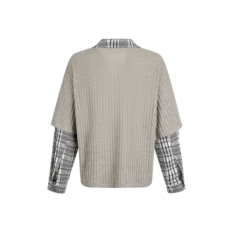 Back view of beige ribbed knit sweater with plaid sleeve cuffs and collar