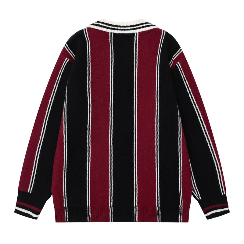 Back view of black and burgundy striped knit sweater with white collar