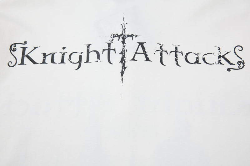 Black Knight Attack gothic text graphic on white polo tee with distressed medieval cross design