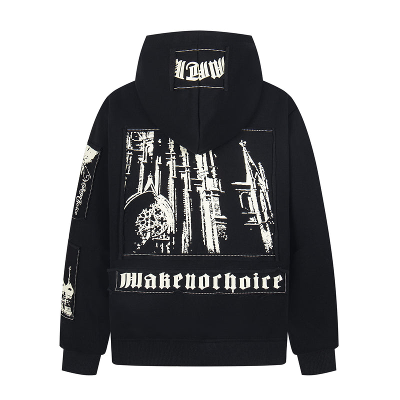 Back of black zip-up hoodie with white gothic text and graphic panel