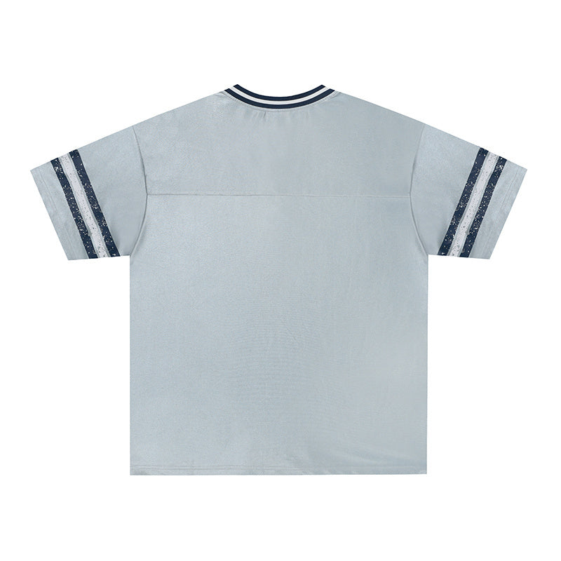 Light gray performance jersey tee with navy striped sleeves and ribbed collar, shown from the back on a clean white background