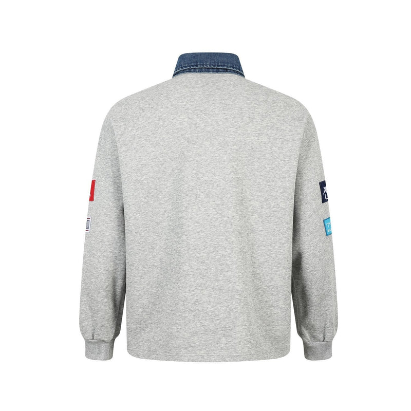 Back view of gray patchwork polo sweatshirt with denim collar and long sleeves