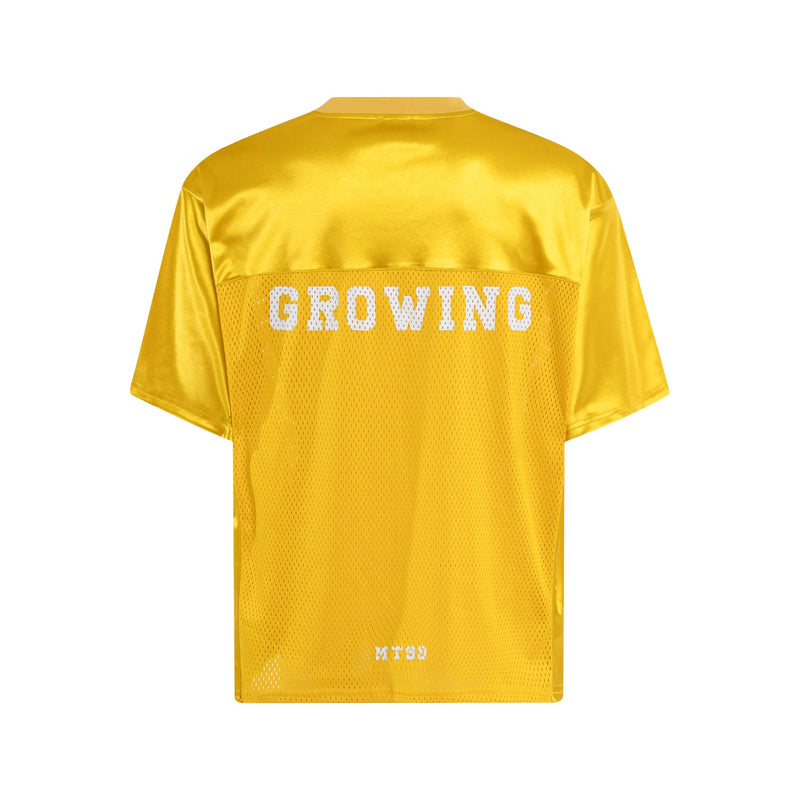Yellow mesh football jersey tee with shiny satin upper panel and bold GROWING graphic on the back