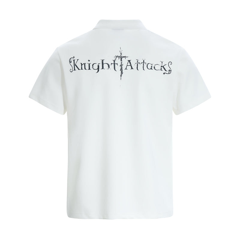 White polo tee with black Knight Attack graphic printed across the back in a gothic medieval style