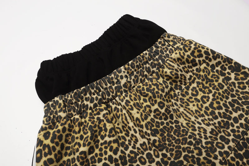 Close-up of leopard print waistband and upper back pocket area on the shorts