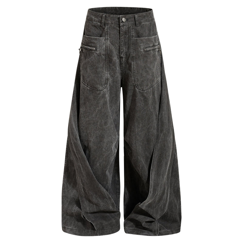 Dark charcoal washed denim jeans front view with wide legs and zipper cargo pockets