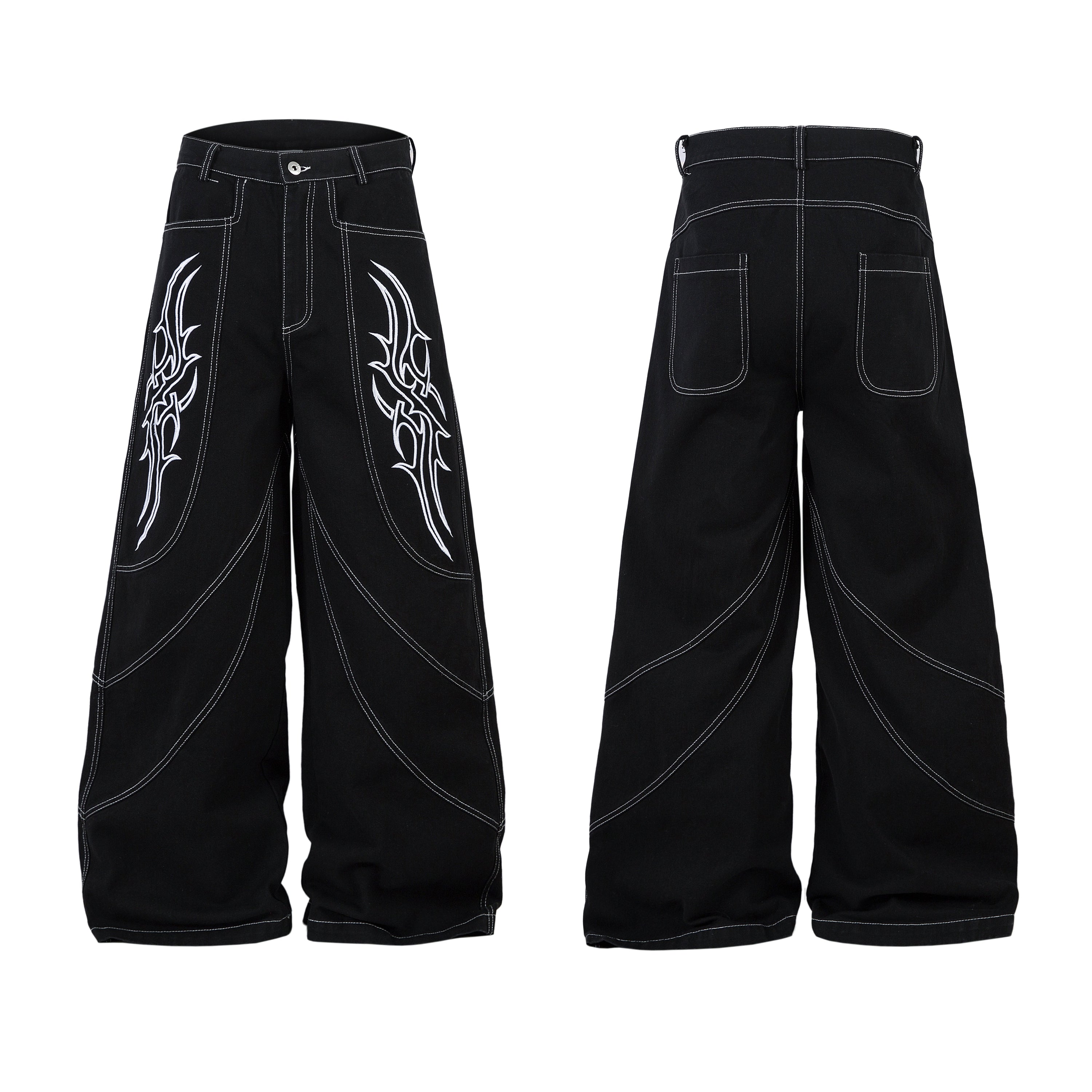 Black wide-leg jeans with white tribal embroidery on thighs and curved contrast stitching, front and back view