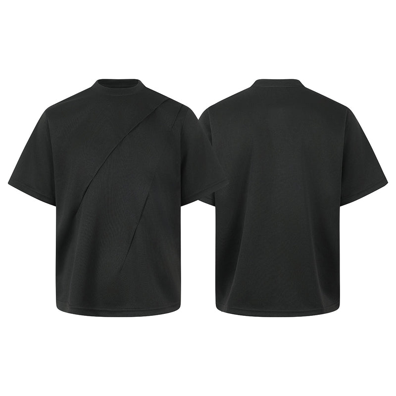 Black oversized tee with asymmetric seam detail, shown front and back on a clean white background
