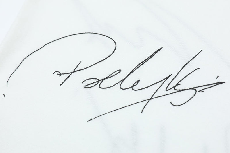 White graphic tee with bold black signature-style autograph print across the chest