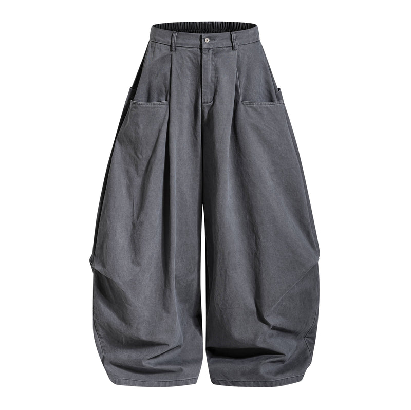 Dark gray wide-leg pants front view with oversized leg openings and side pockets