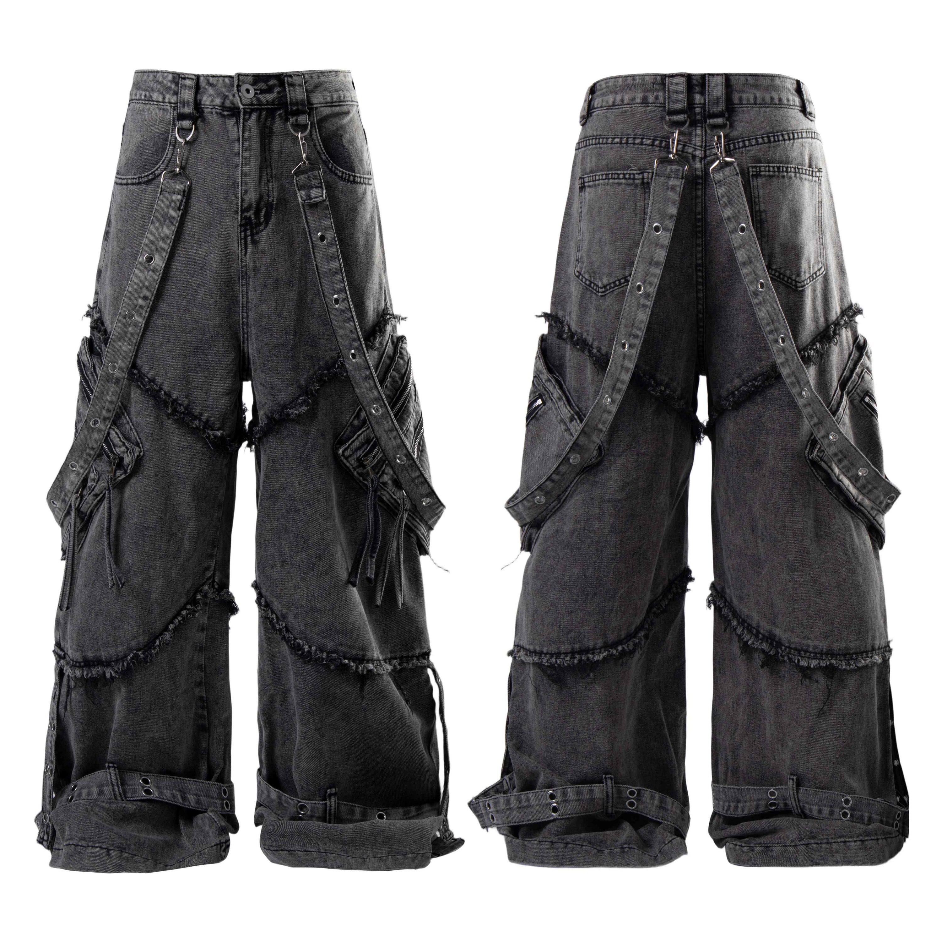 Front and back view of washed black deconstructed strap cargo jeans with raw-edge panels and adjustable diagonal straps