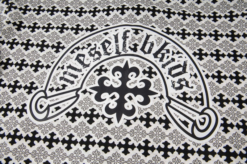 Close-up of back graphic on black and white hoodie