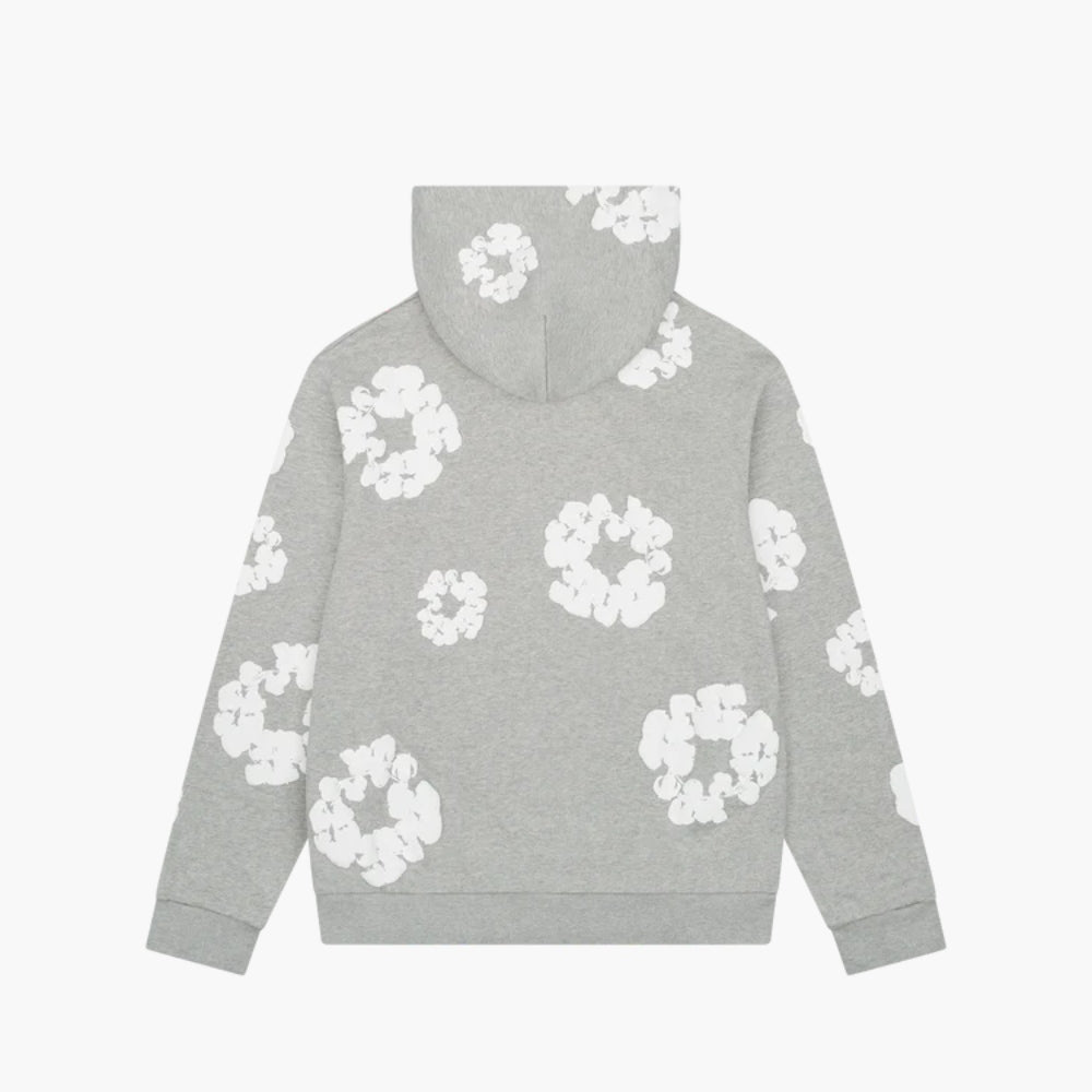 The Gray “Cotton Wreath” Denim Tears Hoodie is a streetwear pullover with a relaxed fit, detailed with white floral cloud-like prints on the back, sleeves, and hood.