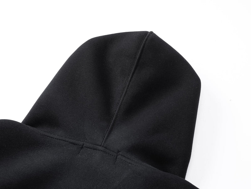 Close-up of black hoodie hood with center seam and soft fabric texture