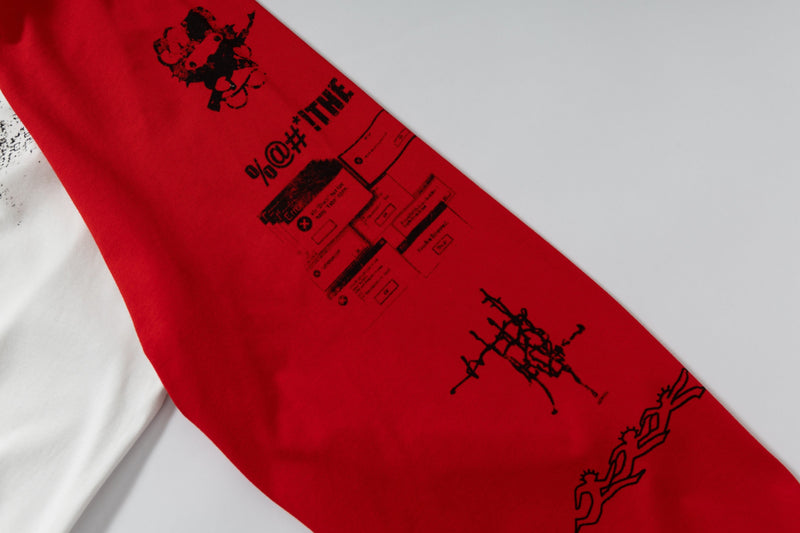 Close-up of red sleeve with black sleeve graphics and text print
