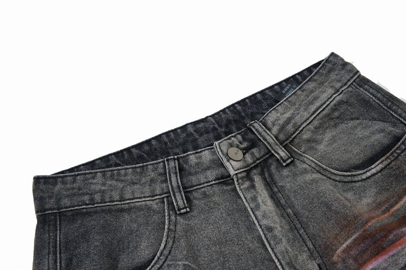 Close-up of the waistband and button on gray distressed cargo denim pants