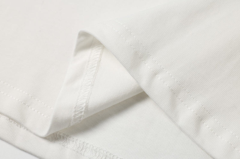 Close-up of white cotton fabric and stitching detail