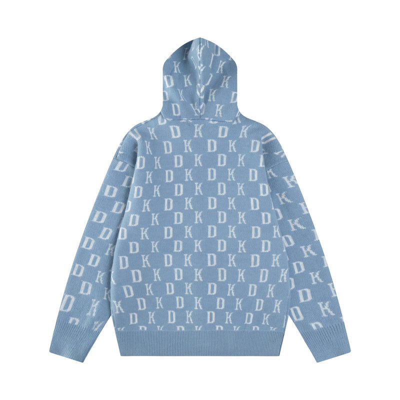 Back view of light blue knit hoodie with allover white monogram pattern and ribbed hem