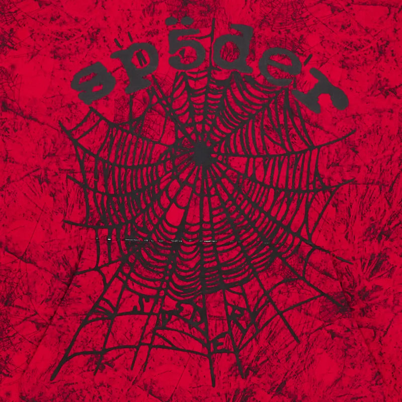 A black spiderweb with "sp5der" above it appears on a red, textured background with abstract markings, reflecting the bold streetwear style of the Red Sp5der Web Hoodie 440GSM – Red Spider Web Graphic Hoodie.
