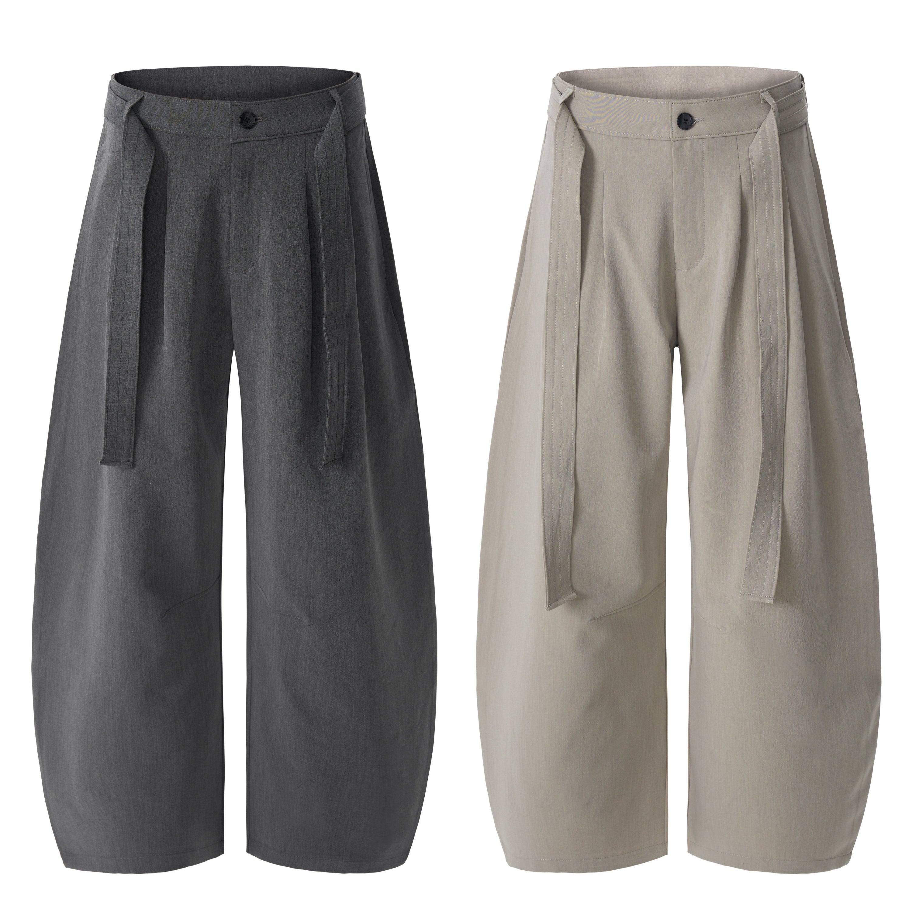 Omirad structured belted barrel-leg pants in charcoal grey and stone beige, front view with double pleats and fabric belt str