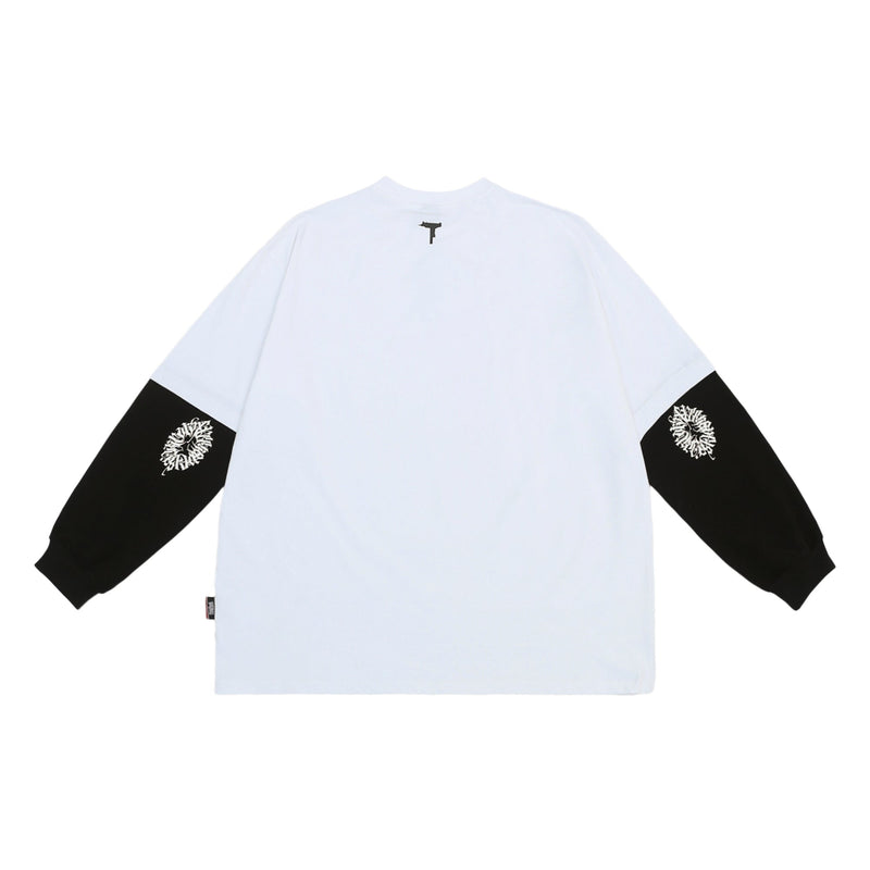 Back view of white long sleeve tee with black sleeves and small black neck graphic
