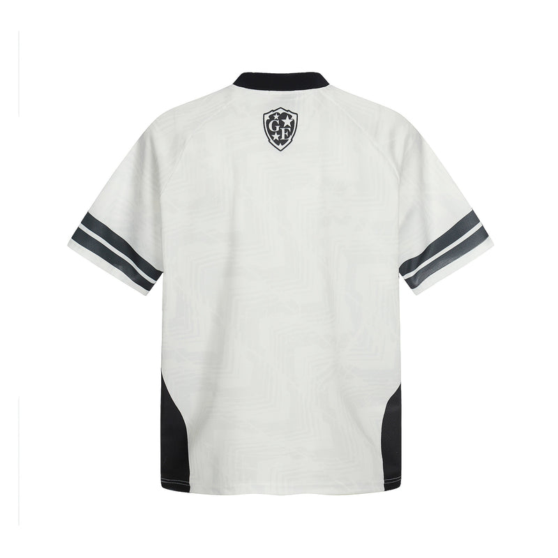 White mesh soccer jersey with black collar, sleeve stripes, and back crest logo, shown flat against a white background