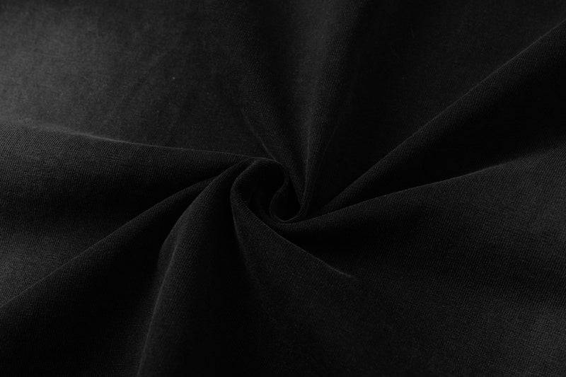 Close-up of black fabric texture with soft folds