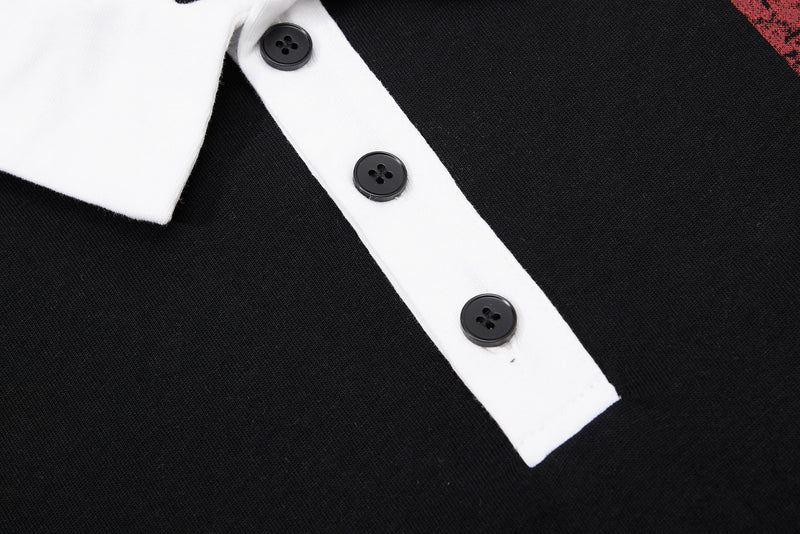 Close-up of a black men's polo shirt with a white button placket and black buttons, featuring vintage streetwear styling