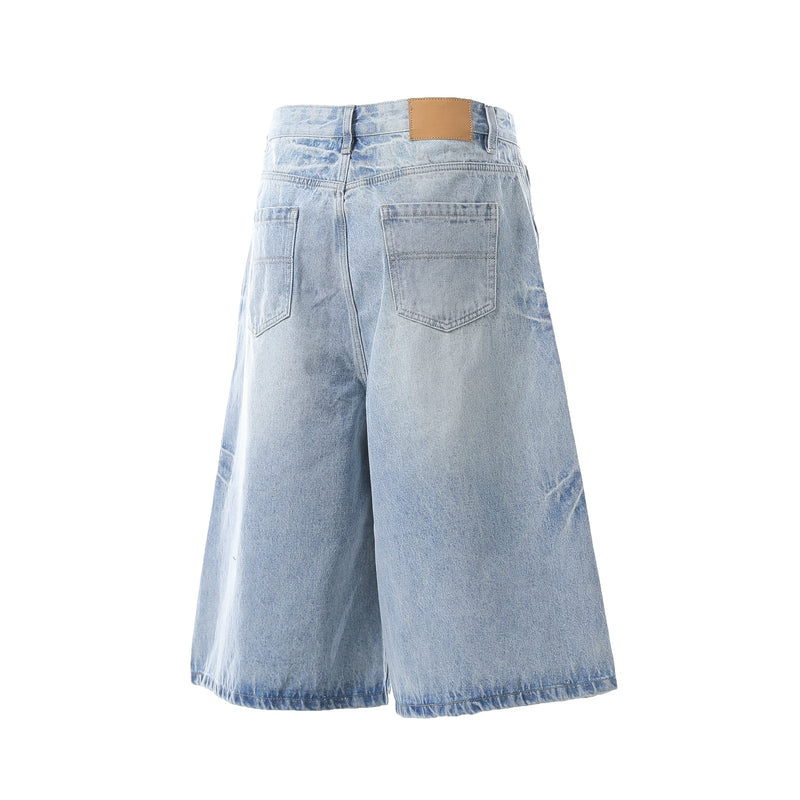 Light wash denim shorts back view showing rear pockets and wide-leg cut