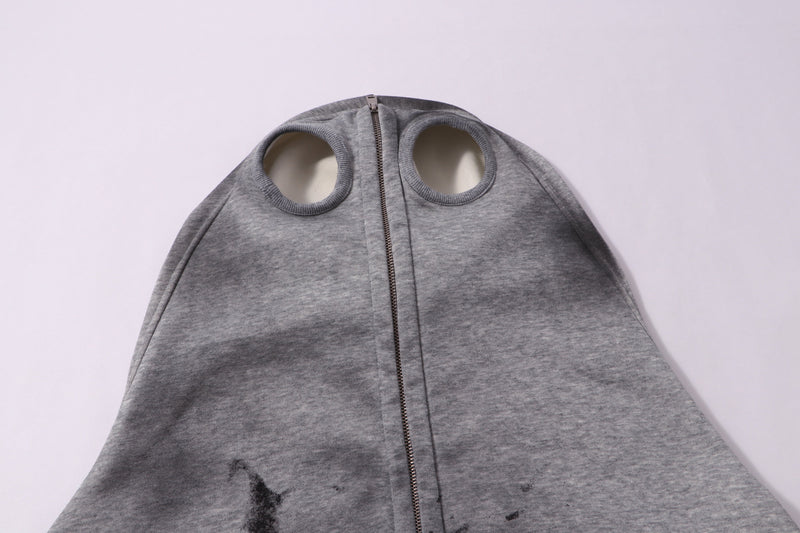 Gray hood with zipper and round eye openings on the attached face mask