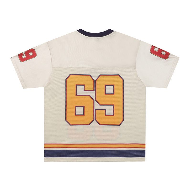 Vintage white football jersey with large 69 on the back, red sleeve numbers, and retro striped hem details