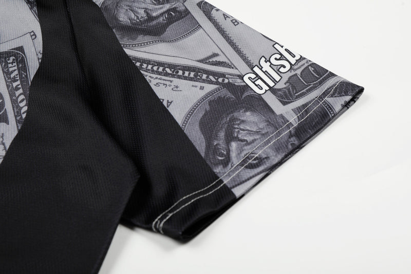 Black mesh football jersey sleeve with grayscale dollar bill print and stitched hem, streetwear style close-up