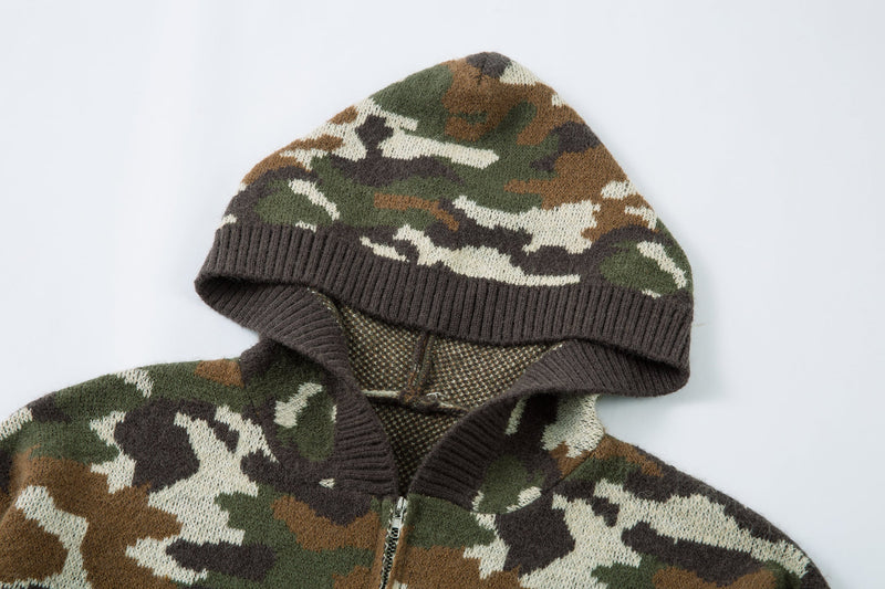 Close-up of the hood on a camouflage knit zip-up hoodie with ribbed trim