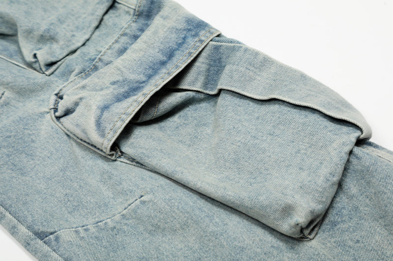 Light wash denim cuff and layered cargo pocket detail