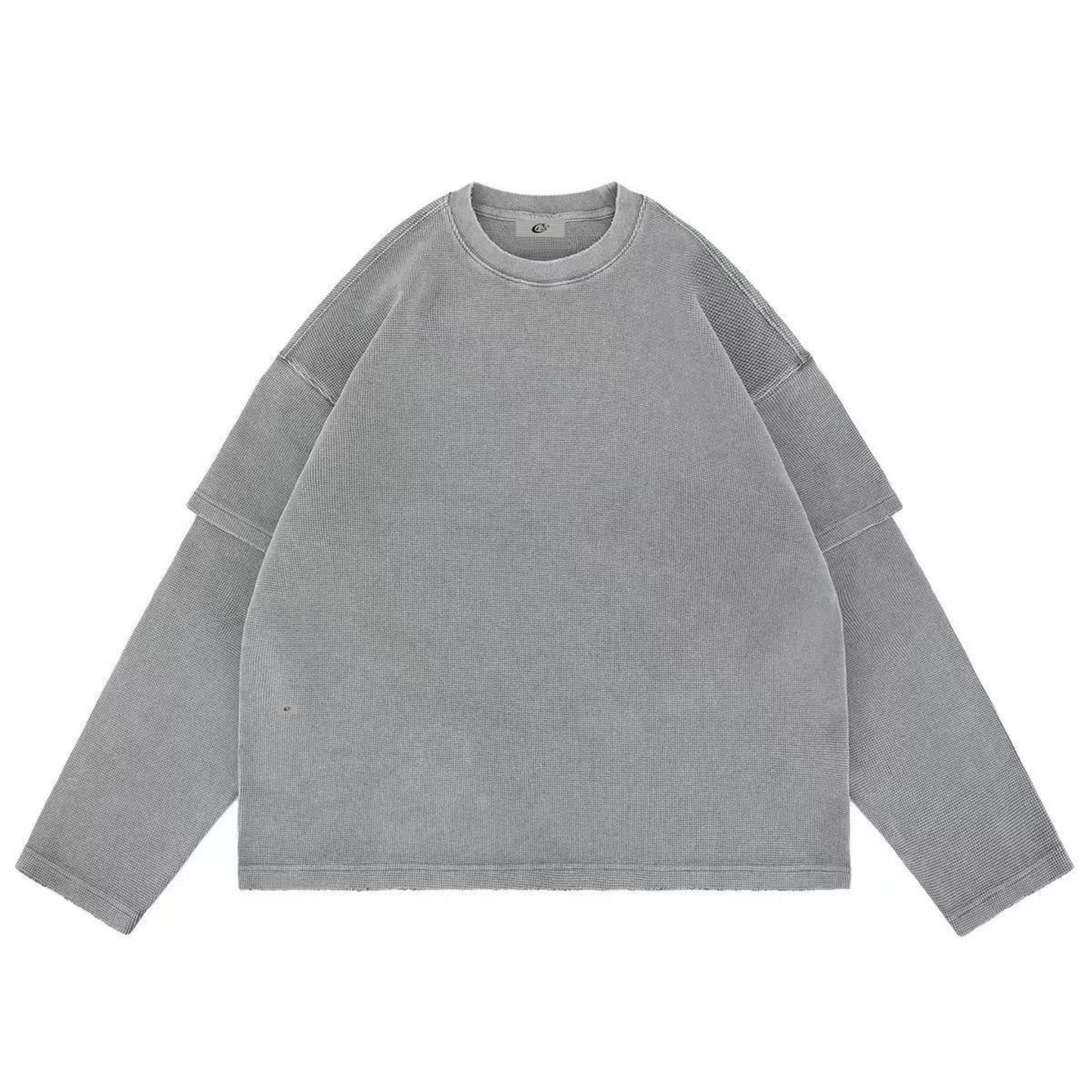 Oversized washed grey corduroy crewneck sweatshirt with drop shoulders and double-layer sleeve detail, flat lay on white back
