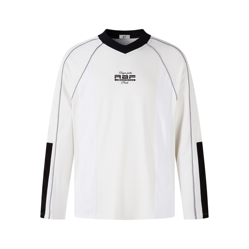 White long-sleeve raglan top with black V-neck collar, front view