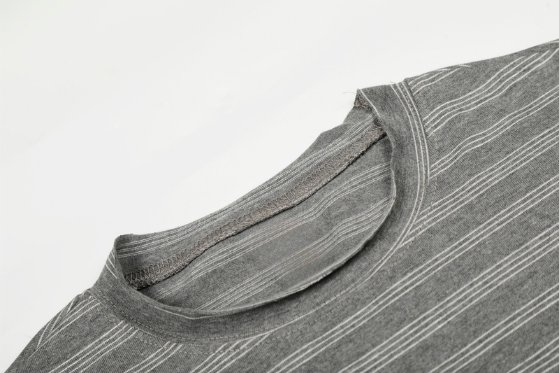 Close-up of gray striped tee neckline and shoulder seam with raw edge detail