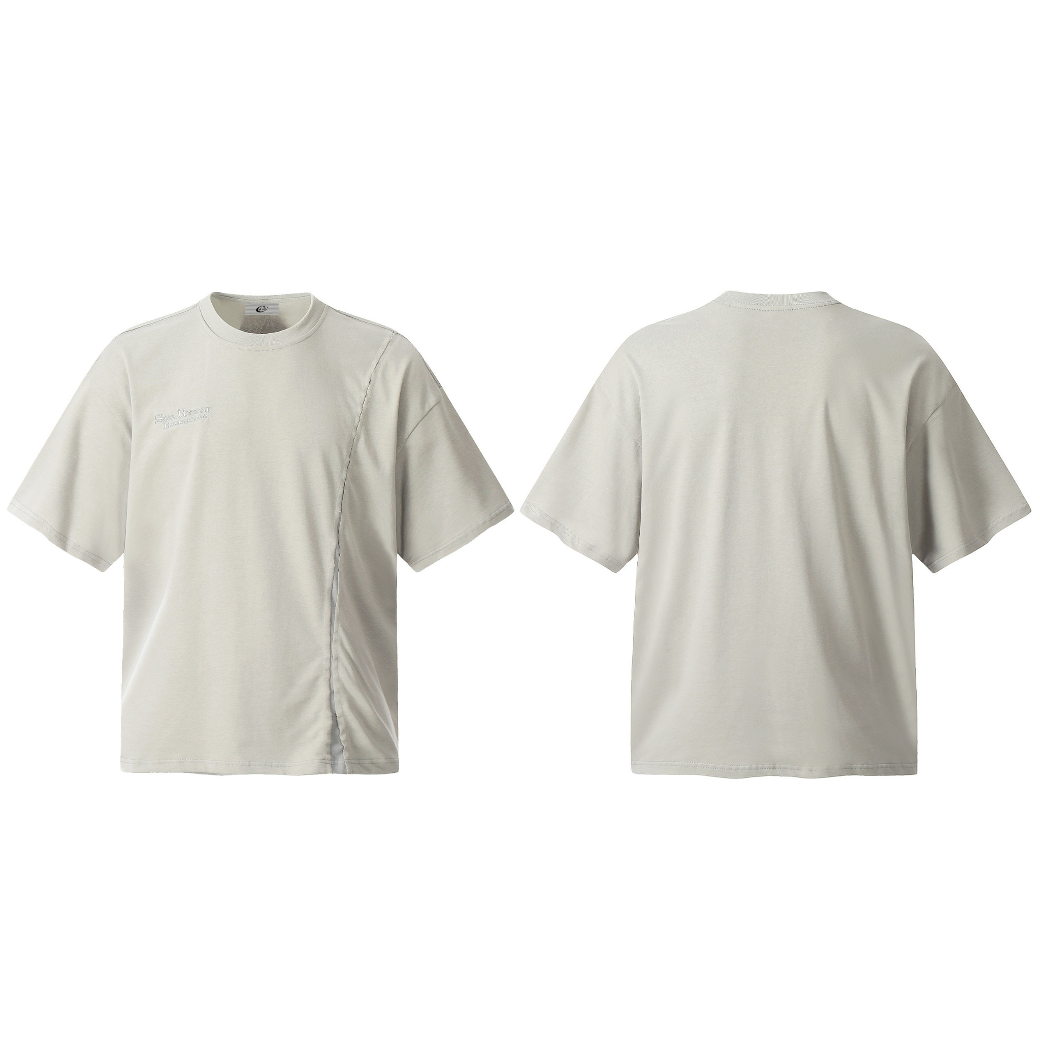 Front and back view of a light stone oversized cotton tee with an asymmetric curved front seam and tonal micro-logo