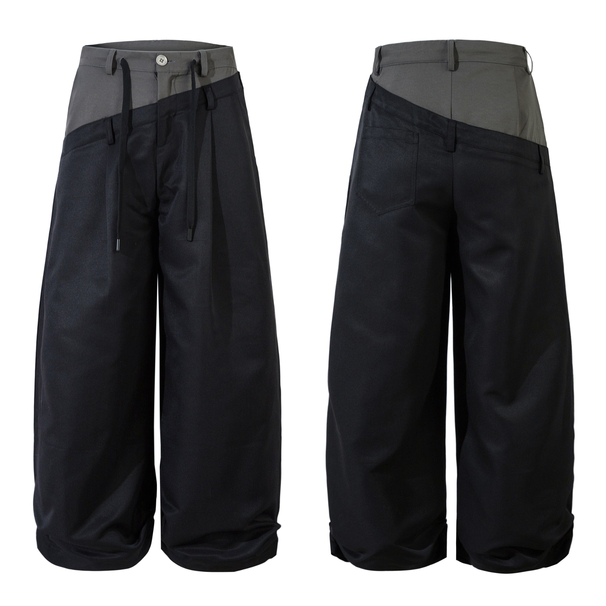 Front and back view of two-tone black and grey wide-leg pants with asymmetric panel design and drawstring waist