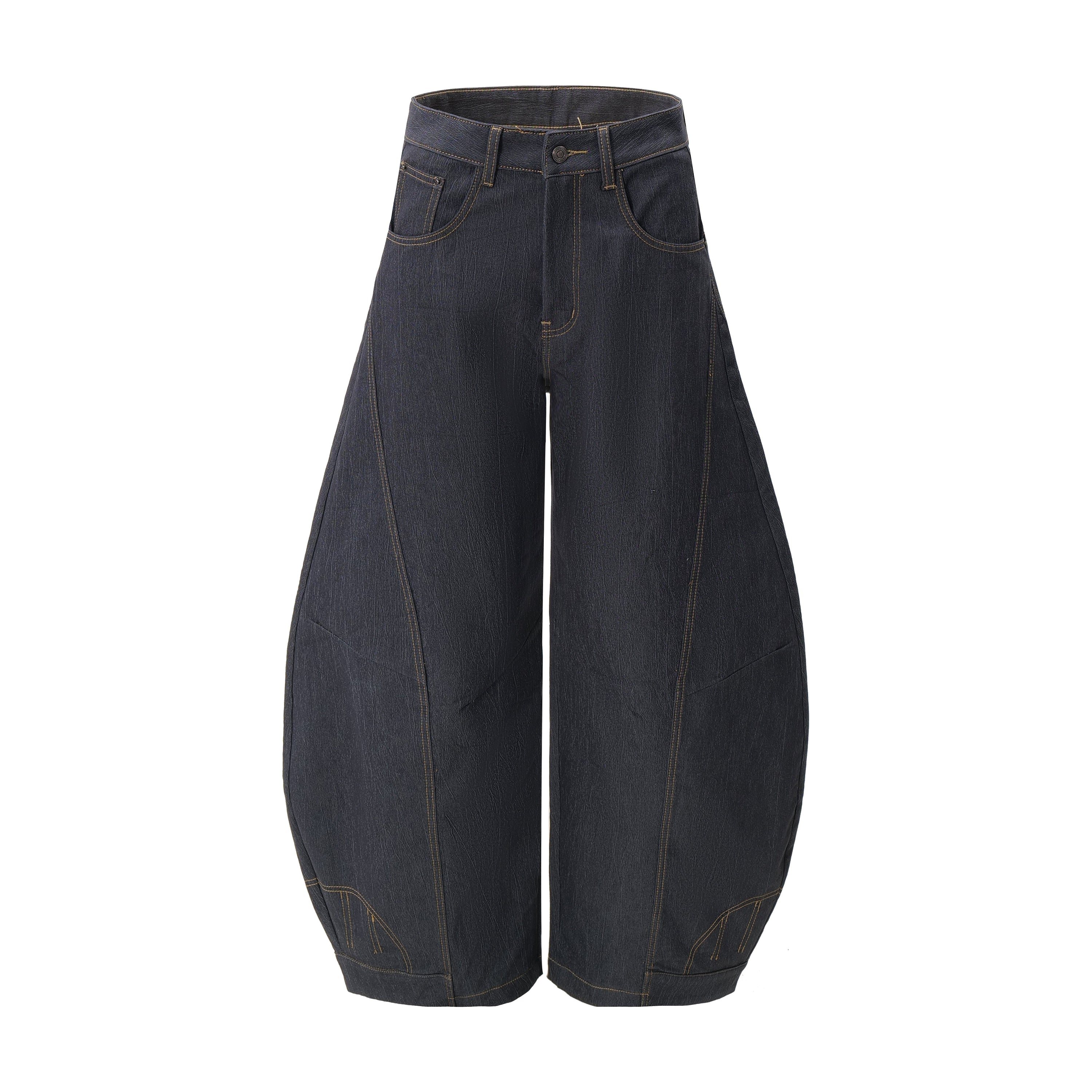 Dark indigo curved balloon wide-leg jeans with contrast gold stitching and structured panel seams, front view