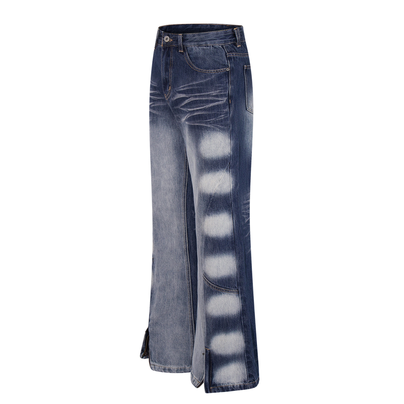 Angled front view of blue wide-leg jeans with gradient fade and split hem details
